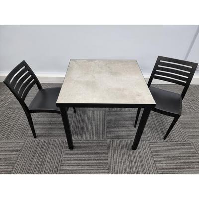 Kelly Ceramic Table in Concrete with 2 Tayla Anthracite Side Chairs