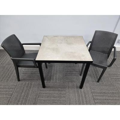 Kelly Ceramic Table in Concrete with 2 Candice Armchairs